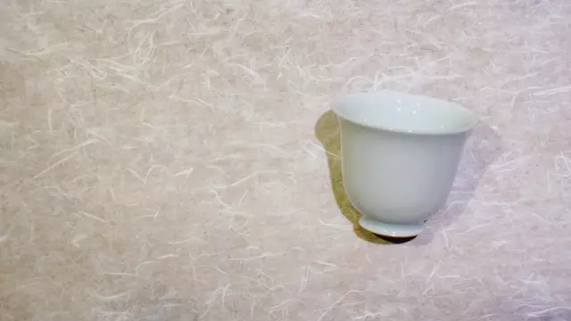 Mineral-glazed cups with crystalline surfaces
