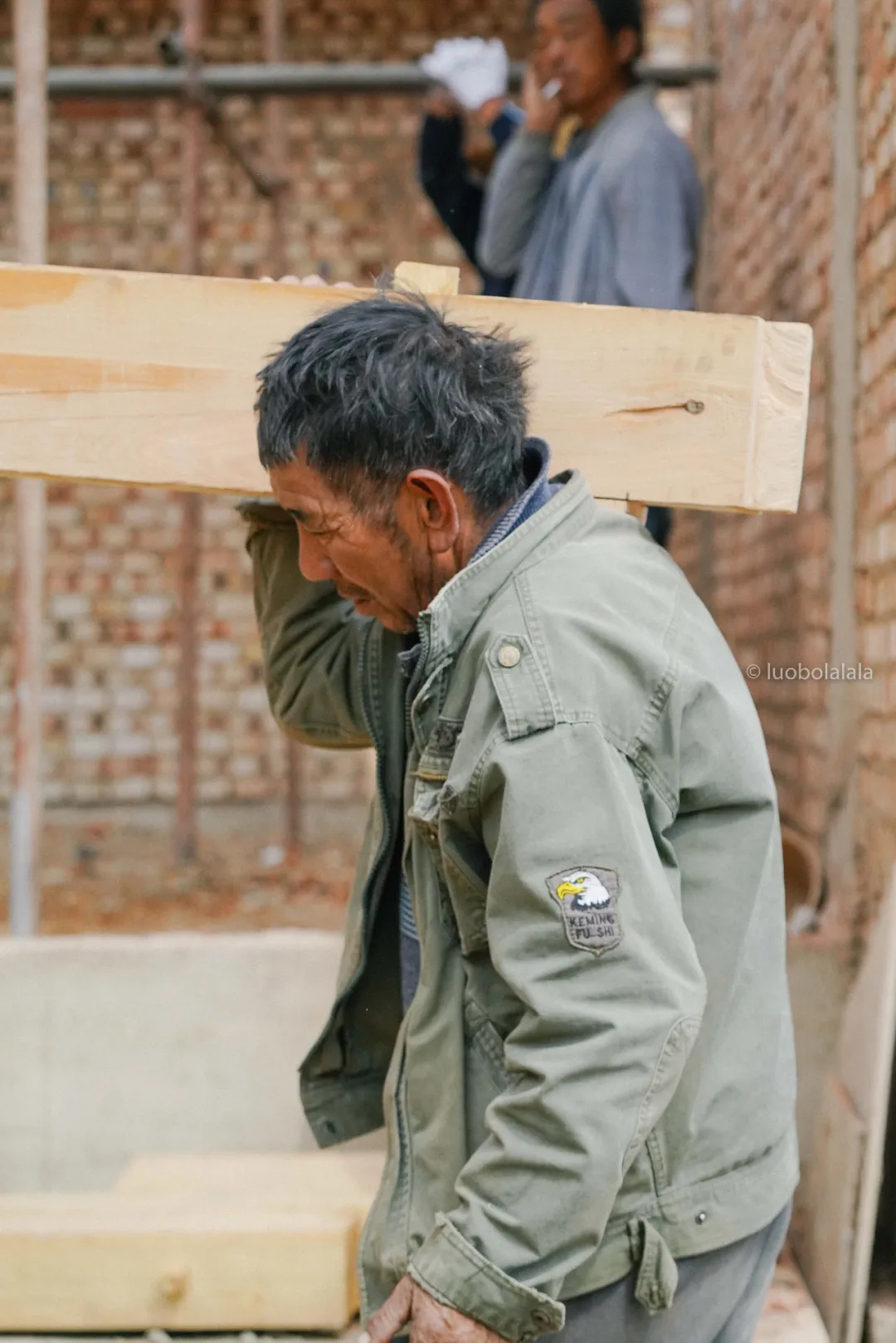 Carpenters working above the new house