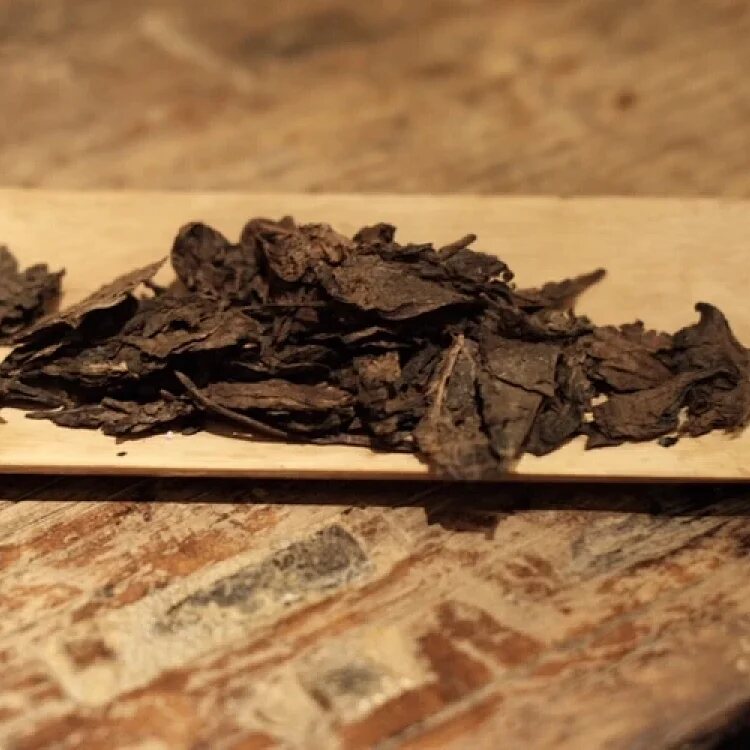 Another view of Yingzhuan · Aged Yellow-Leaf Ripe Pu’er